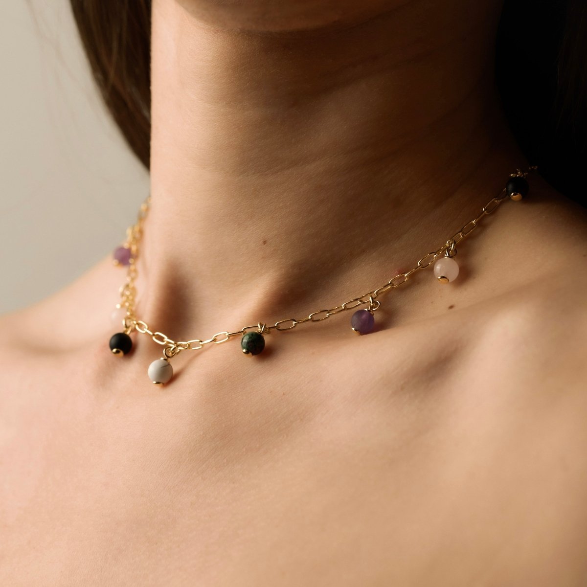 Model wearing Ancient beads necklace by Macabre Gadgets - gold-plated chain necklace with natural stones
