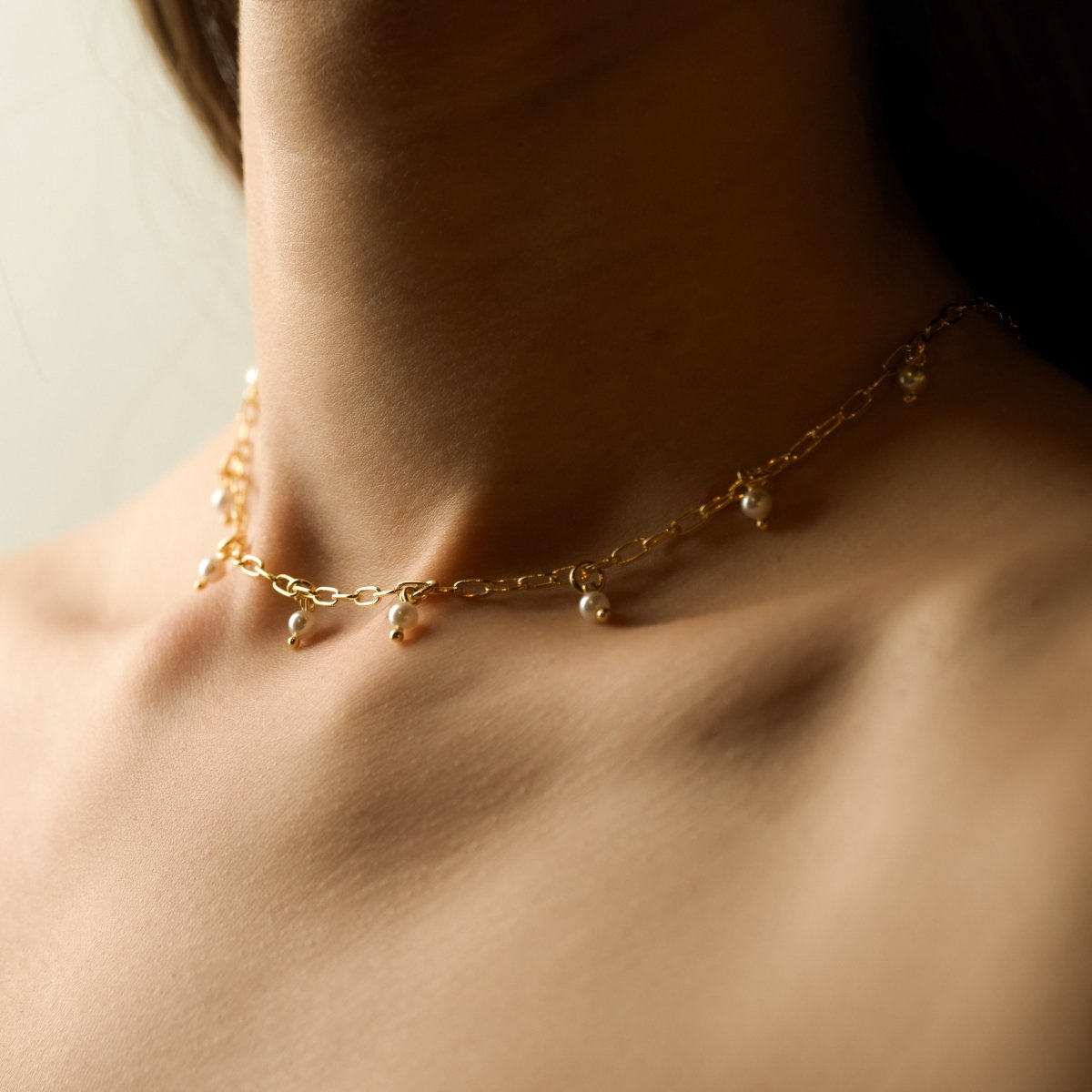 Ancient Pearl necklace on a model's neck - boho necklace styling shot