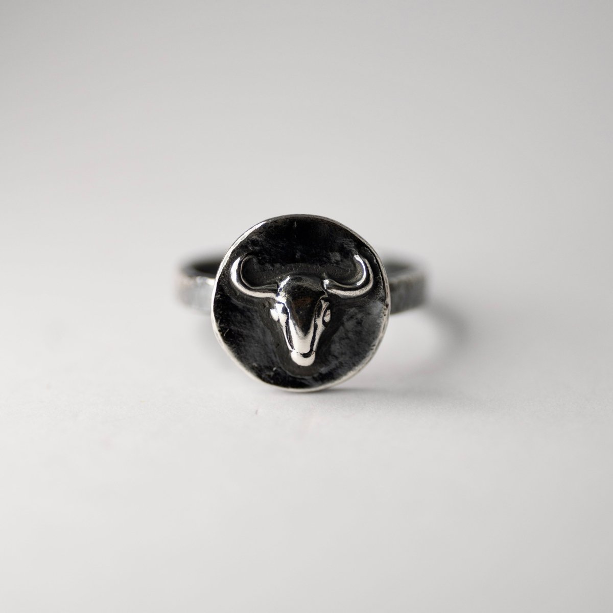 Bull Ancient Coin ring - modern antiquity silver ring, close-up of a coin detail with Ox relief