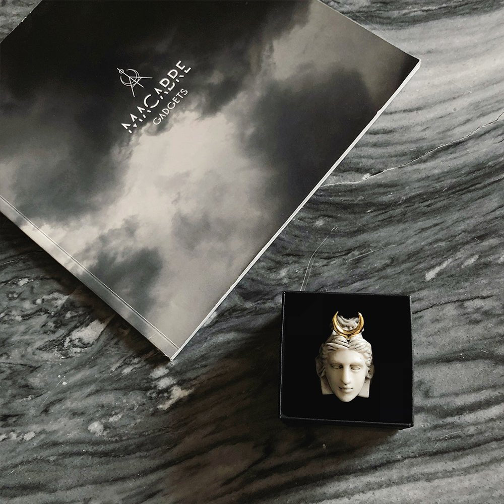 Artemis ring in jewelry box on grey marble surface - boho romantic jewelry lifestyle shot