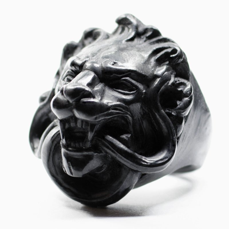 Close-up of Marble Lion ring - black variant - sculptural gladiator inspired signet ring on white background