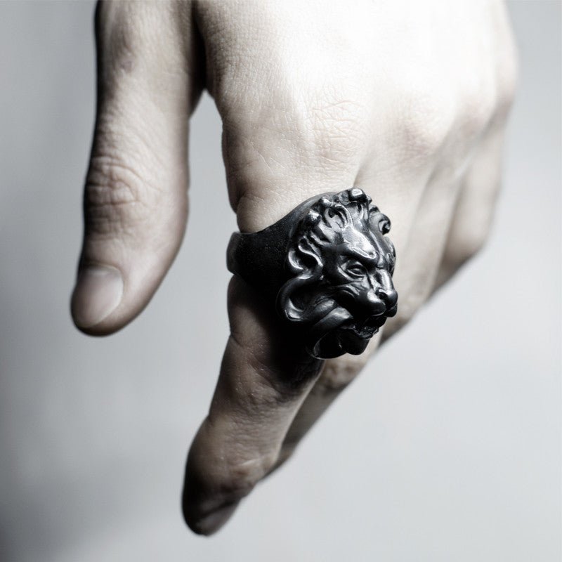 Close-up of model's hand wearing Marble Lion ring - boho style chunky mythology ring