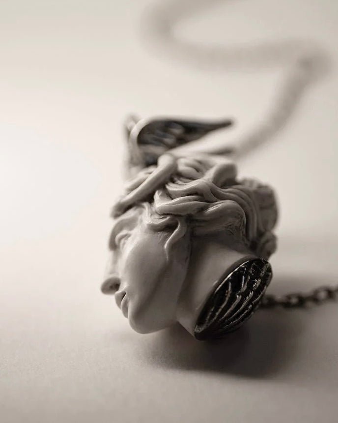 Medusa pendant - silver variant - on neutral surface
