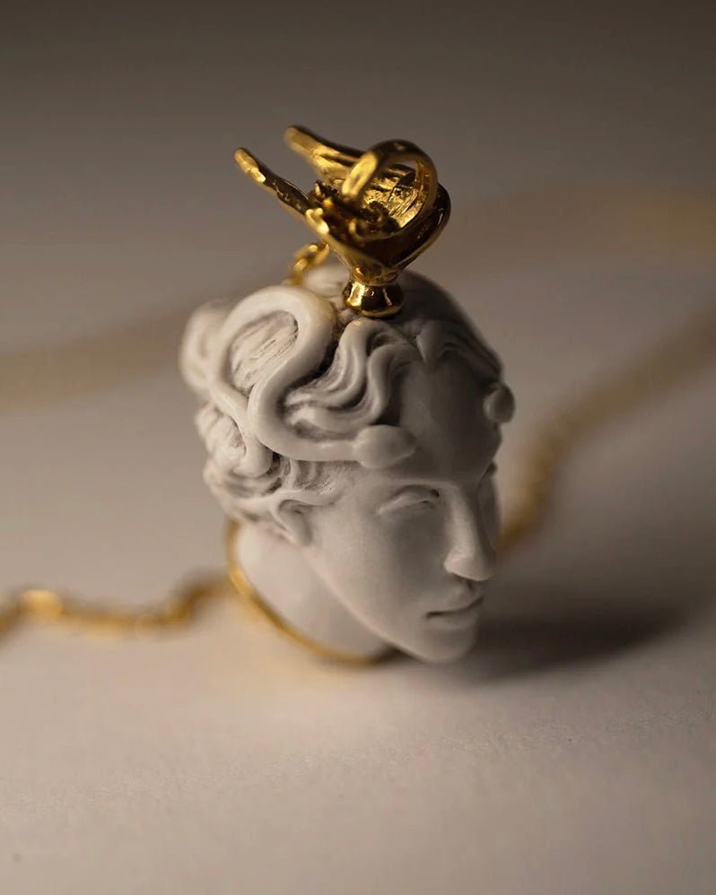 Medusa pendant by  Macabre Gadgets - mythology inspired sculptured pendant on neutral surface