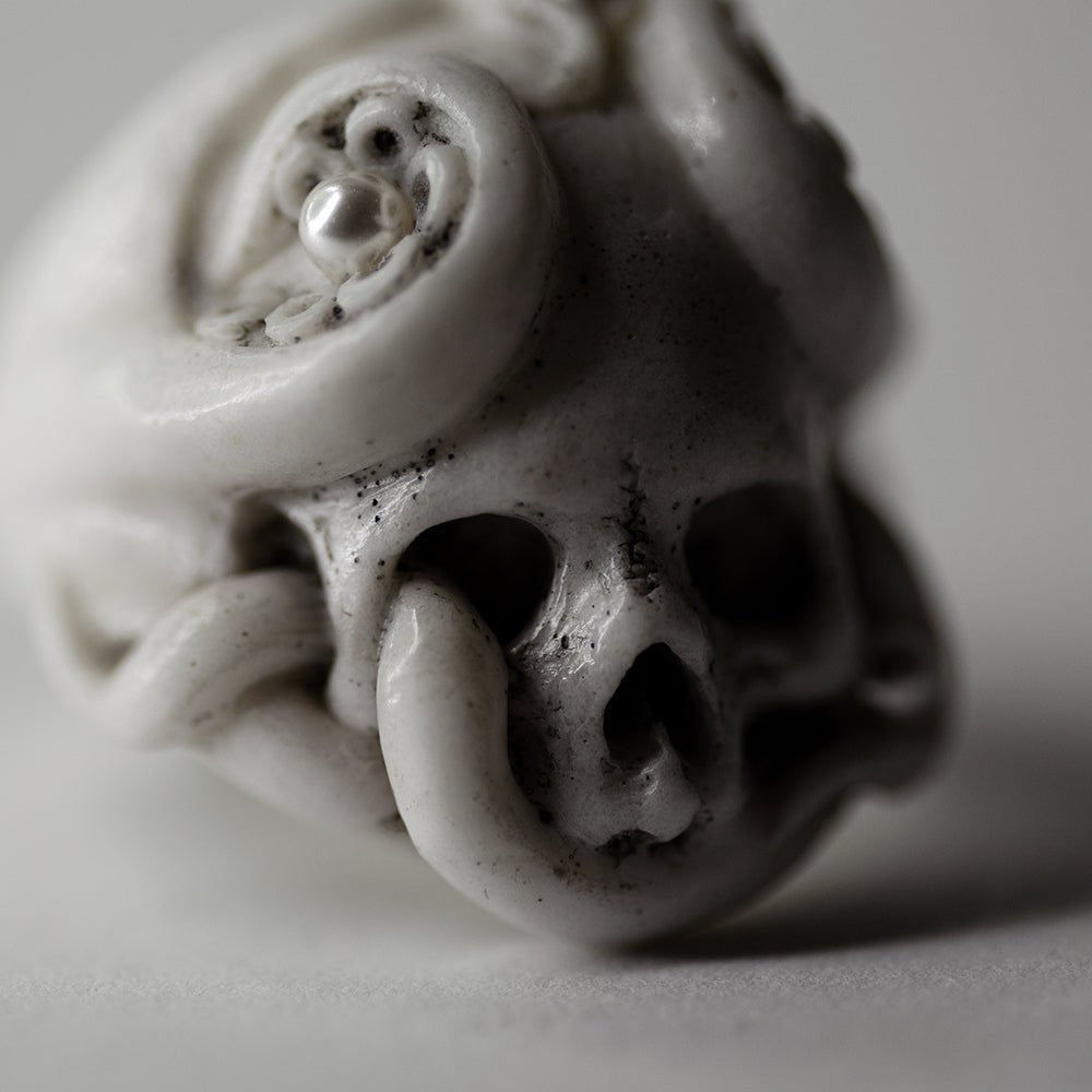 Octopus Skull ring - close-up of netsuke-like ring in shape of skull entangled in tentacles