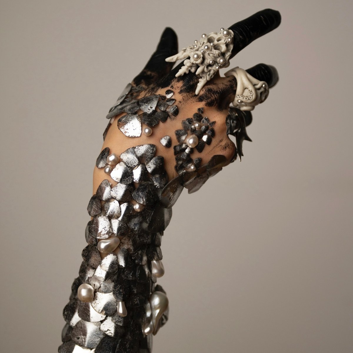 Octopus Skull ring featured in Siren by Macabre Gadgets campaign on a mermaid's  hand covered in silver scales - artistic fashion editorial