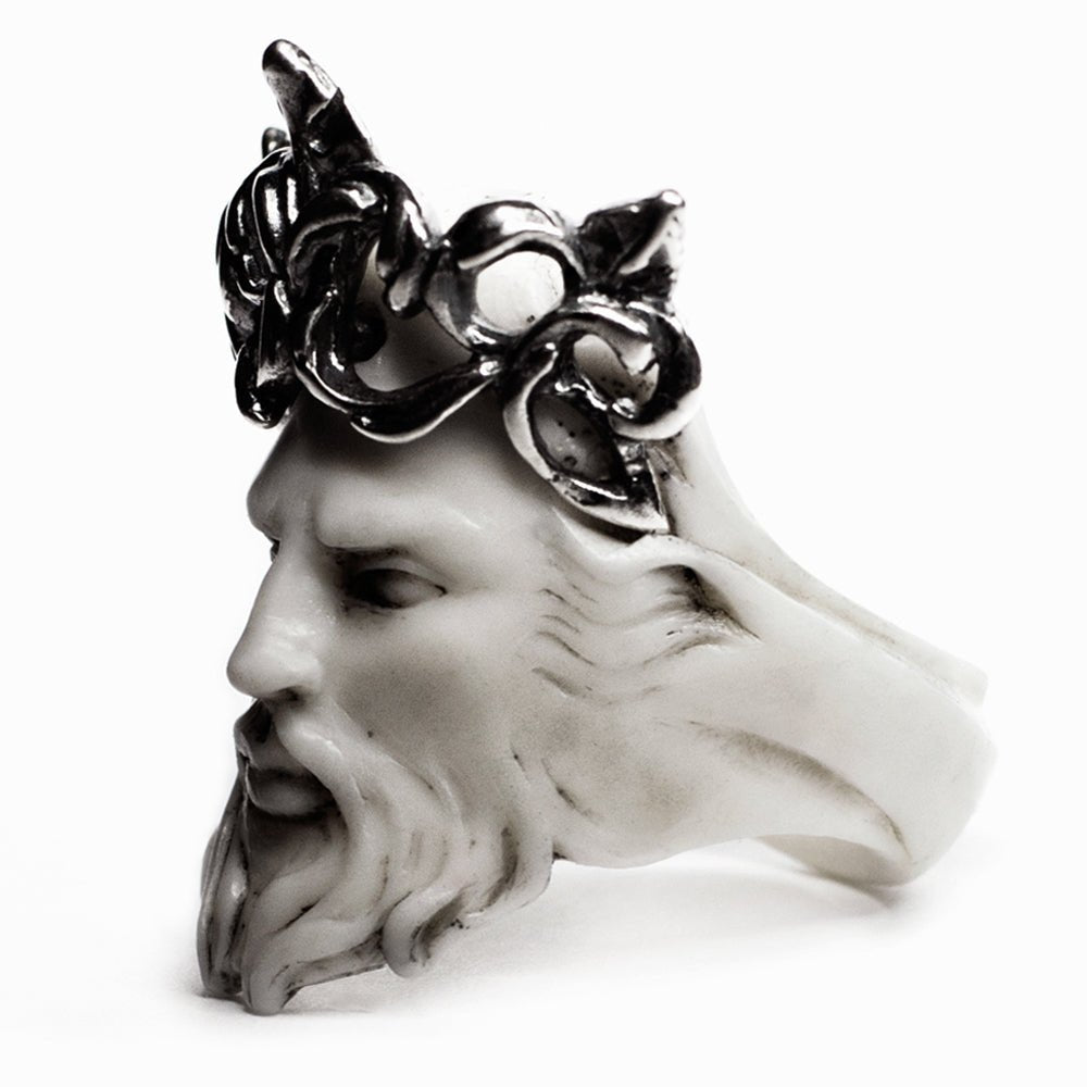 Close-up of Poseidon ring - white marble statue-like ring featuring Neptune in sterling silver crown