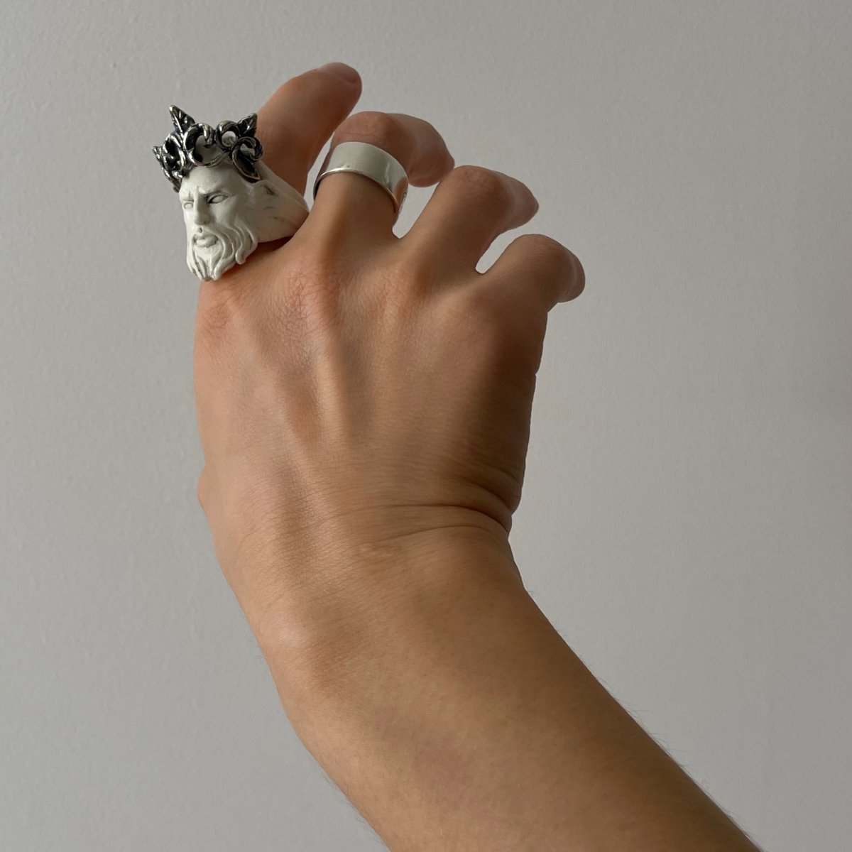 Model wearing Poseidon ring - mythology inspired sculpture ring in marble and silver