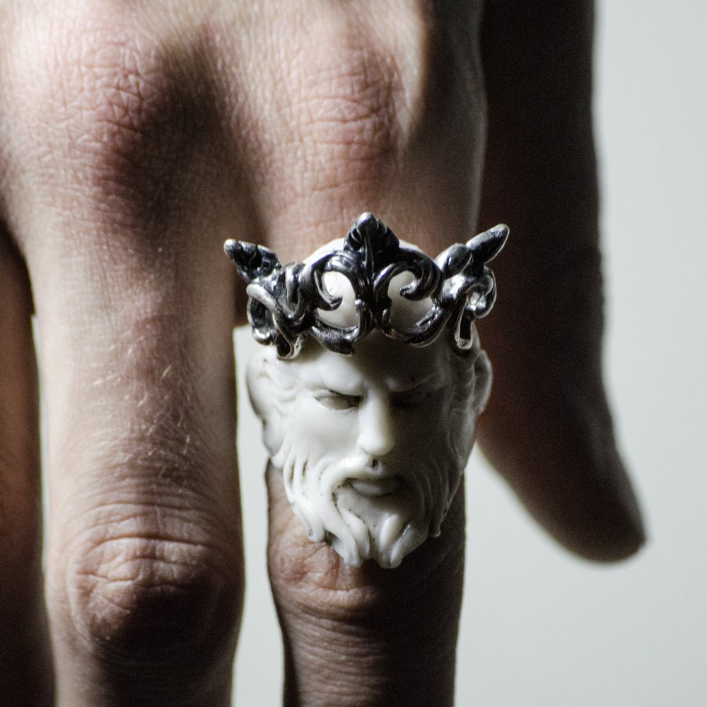 Poseidon ring on a model's hand, close-up of a marble boho style statement chunky ring