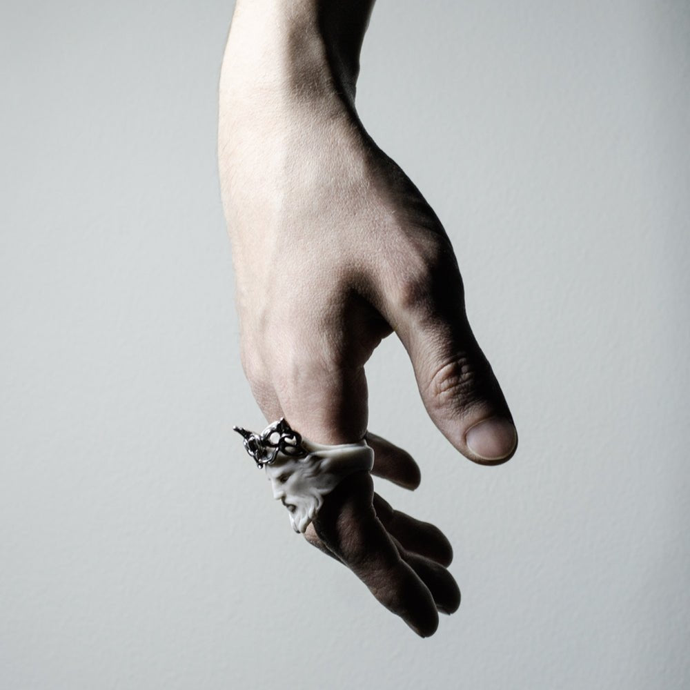 Poseidon ring on a model's hand - modern antiquity ring styling shot