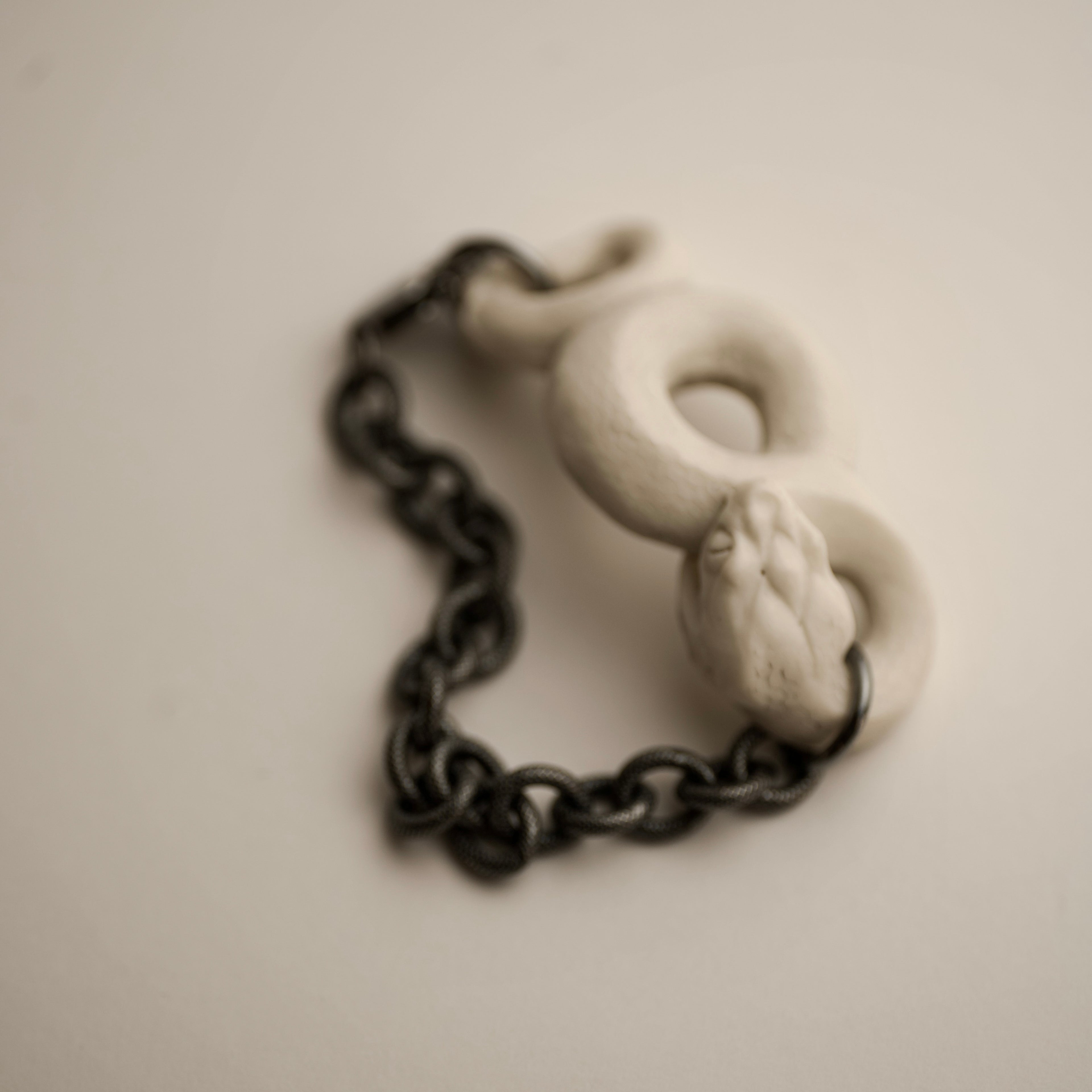 White Snake bracelet by Macabre Gadgets on a white background