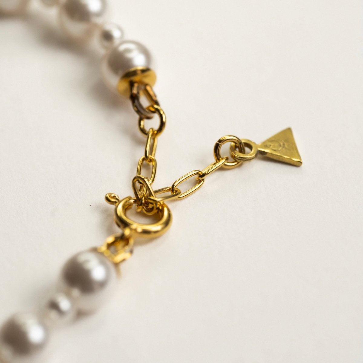 Aegean Pearl choker - logo detail close up