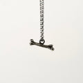 Tiny one pendant - string silver small textured bone charm on dainty chain