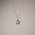 Eye pendant by Macabre Gadgets - small pendant in gold plated finish with marble cameo on neutral background