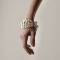 Multi-strand Pearl bracelet on a model's hand - fit and dimensions are shown