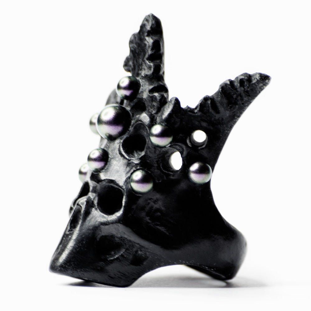 Pearl Crown Skull ring black variant — black marble skull with fleur-de-lys crown, vegan pearl spires, white surface | Macabre Gadgets