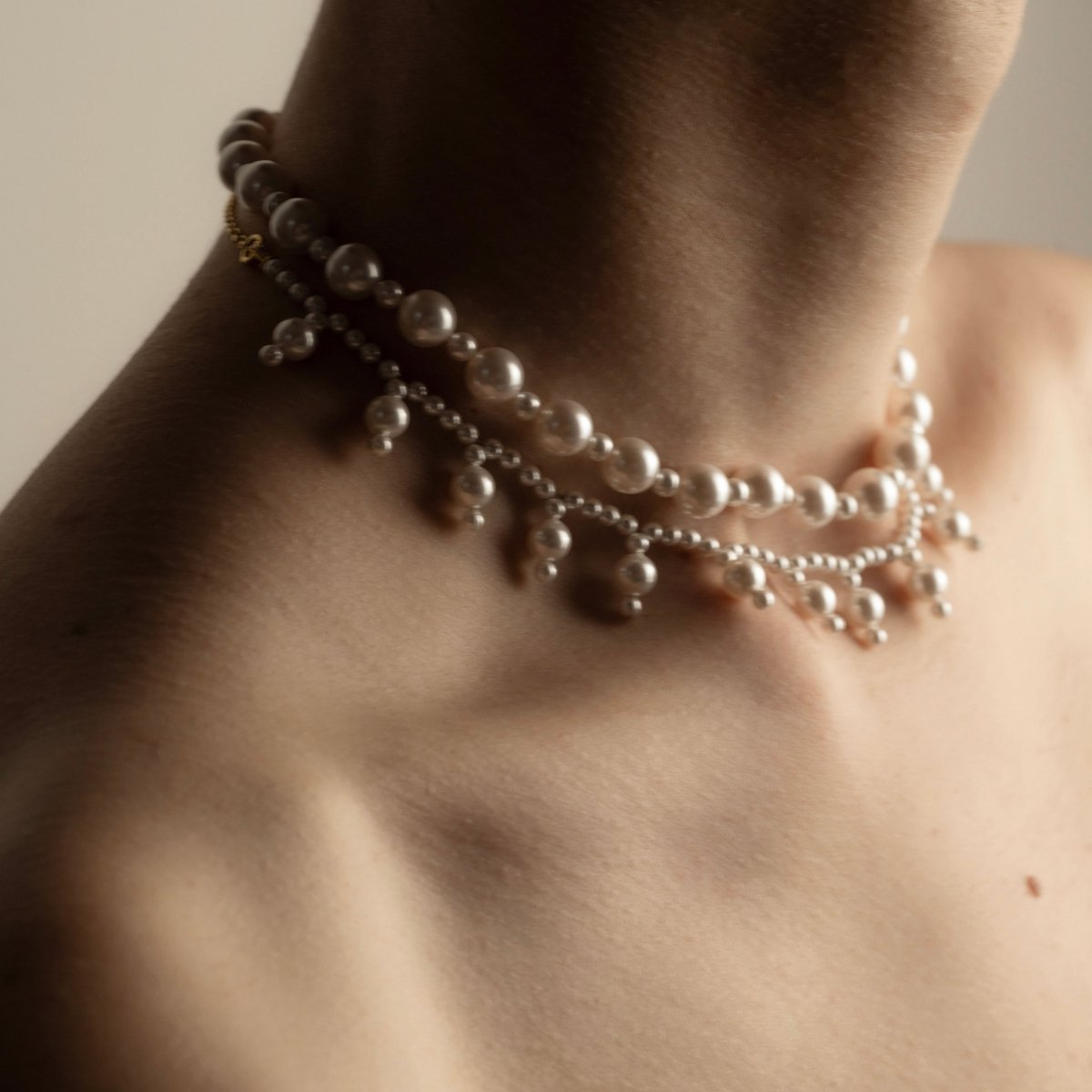 Aegean Pearl choker styled with Sacred Pearls necklace by Macabre Gadgets on female model