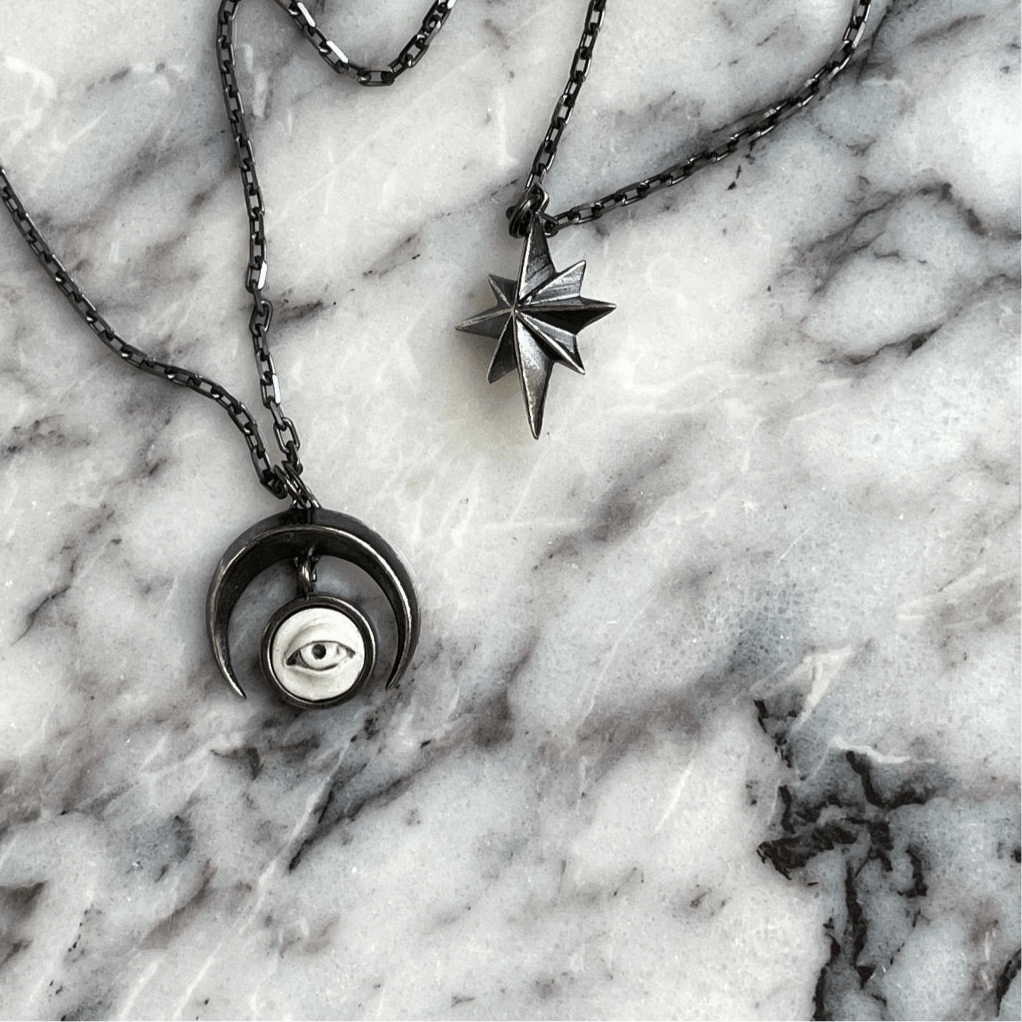 Star bracelet - silver variant - on a striking white marble, silver chain resembling black marble veins