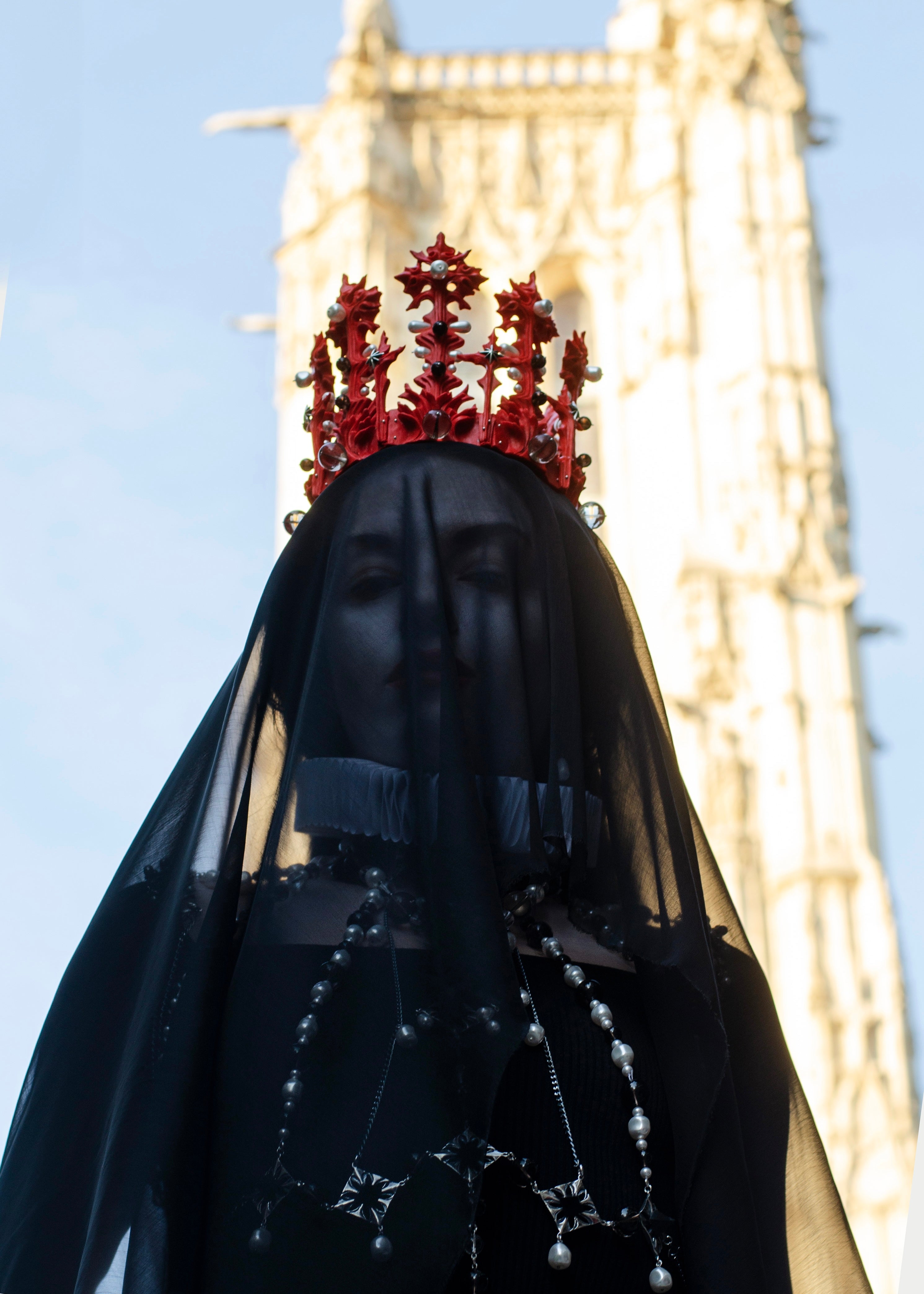 Crowned and veiled female figure in heavy jewels with Gothic architecture on a background— Vampire editorial by Macabre Gadgets, Gothic Medieval world