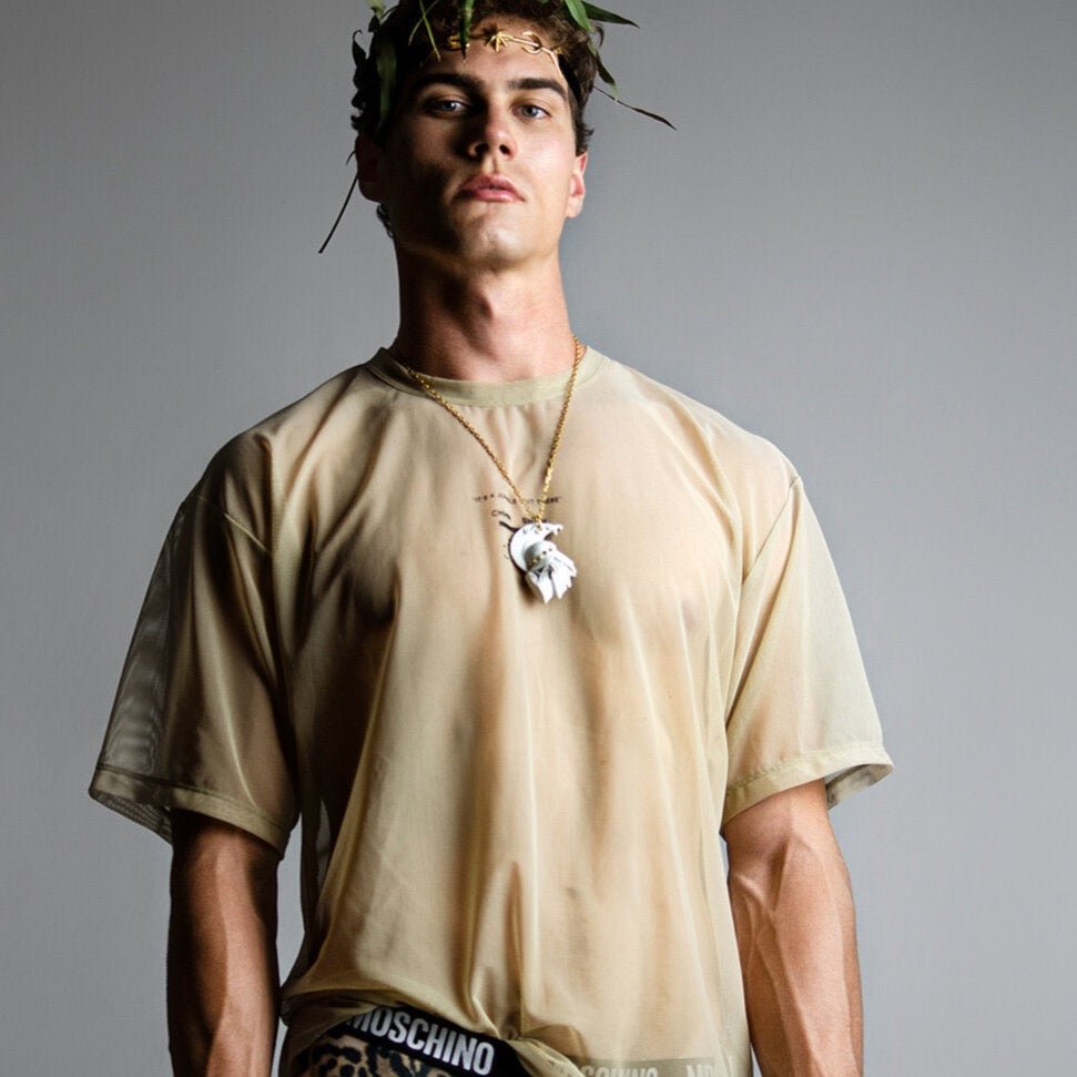 Athena pendant on a male model in a hellenistic inspired fashion editorial 