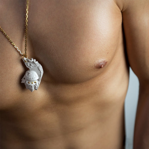 Greek Goddess pendant on a male model, perfect contrast of smooth white marble and tanned skin