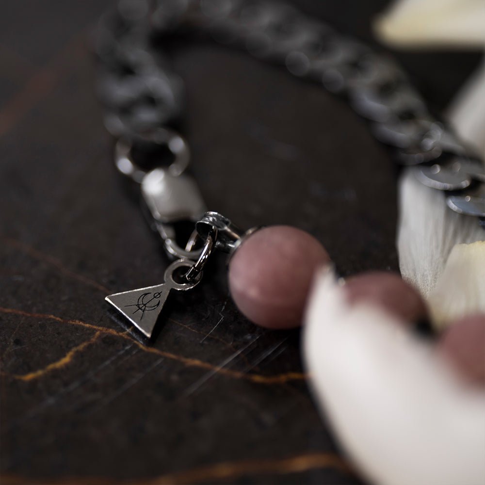 Bird Skull Bracelet - close up of a lobster clasp and a miniature logo detail