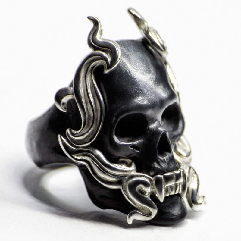 Black Mayla Skull ring - semi-profile view, sterling silver details and marble skull are clearly visible