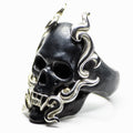Black Mayla Skull ring - semi side view, different angle, showing black ring with silver elements