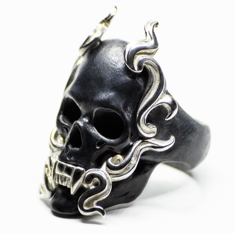 Black Mayla Skull ring - semi side view, different angle, showing black ring with silver elements