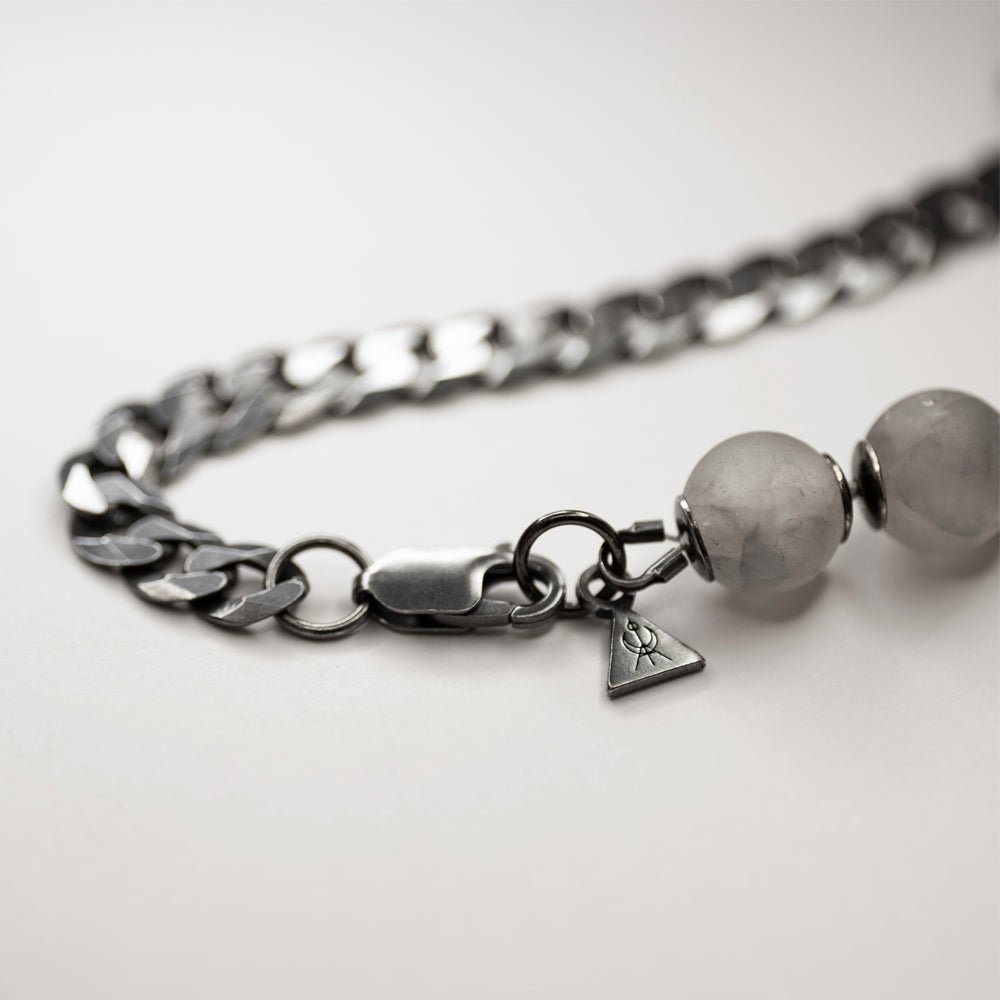Claw Bracelet - close up of the lobster clasp and miniature logo detail