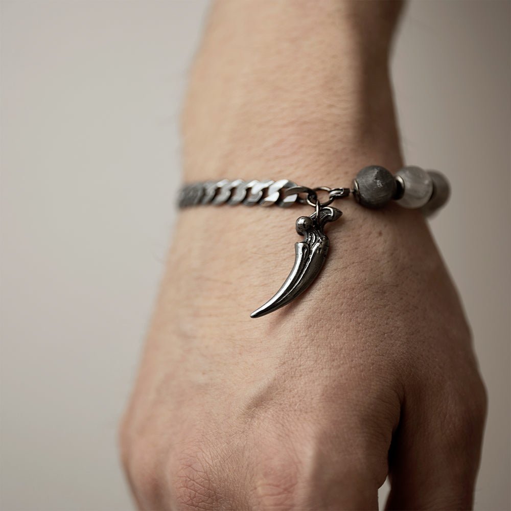 Claw Bracelet on a wrist - close up of a claw charm