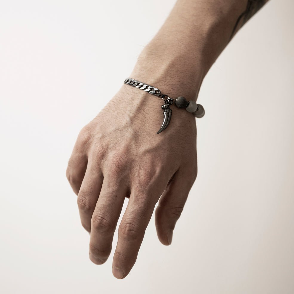 Claw Bracelet on a man's wrist to show the general fit and dimensions of the beads, chains and charm