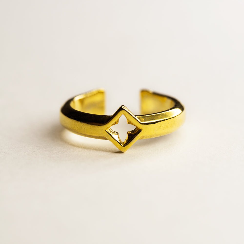 Gothic Clover ear cuff - front view of gold-plated gothic ear cuff on white surface