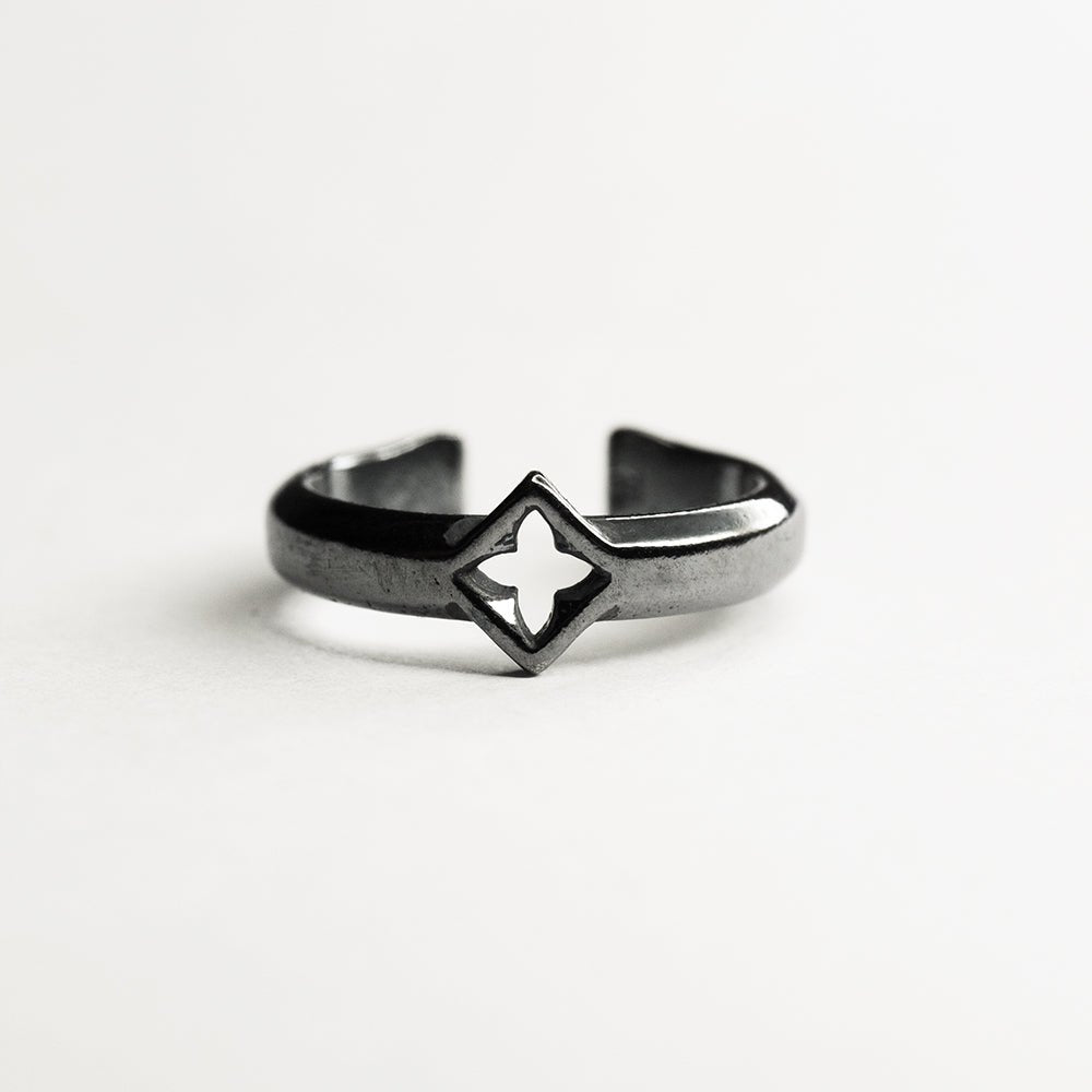 Gothic Clover ear cuff - sterling silver gothic architecture-inspired ear cuff on white surface