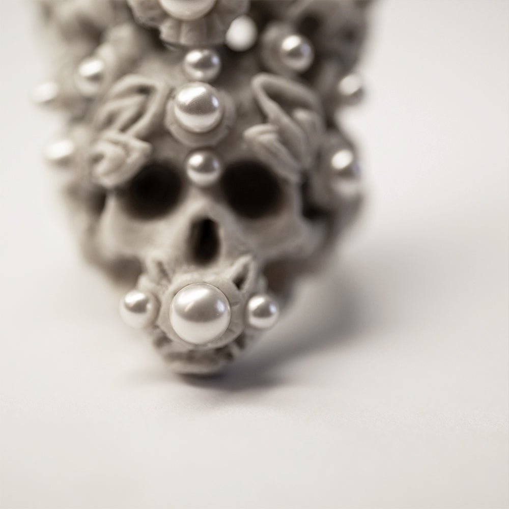 Coral Crown Skull ring close-up — marble skull detail with coral spires richly inlaid with vegan pearls | Macabre Gadgets