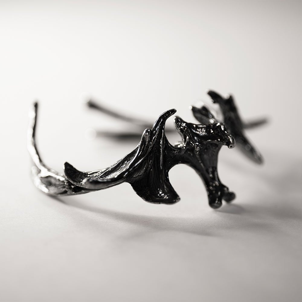 Vertebrae Crest Bracelet placed on a white surface - different angle