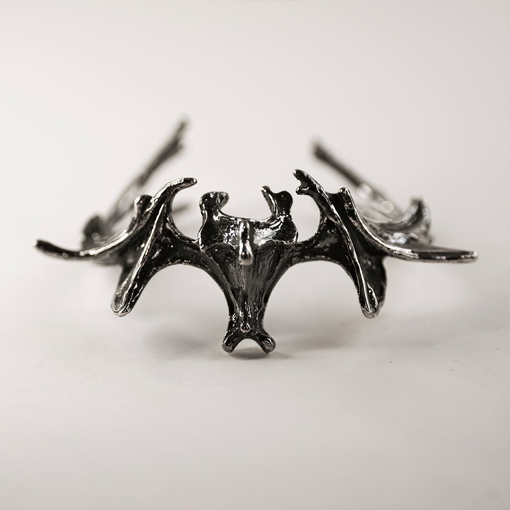 Vertebrae Crest Bracelet on a white surface - front view