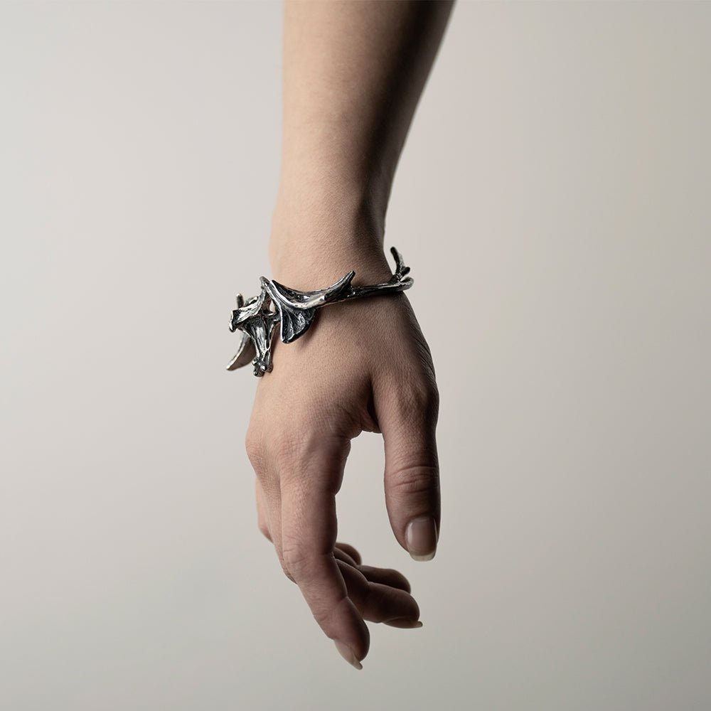 Vertebrae Crest Bracelet on a woman's wrist, side view