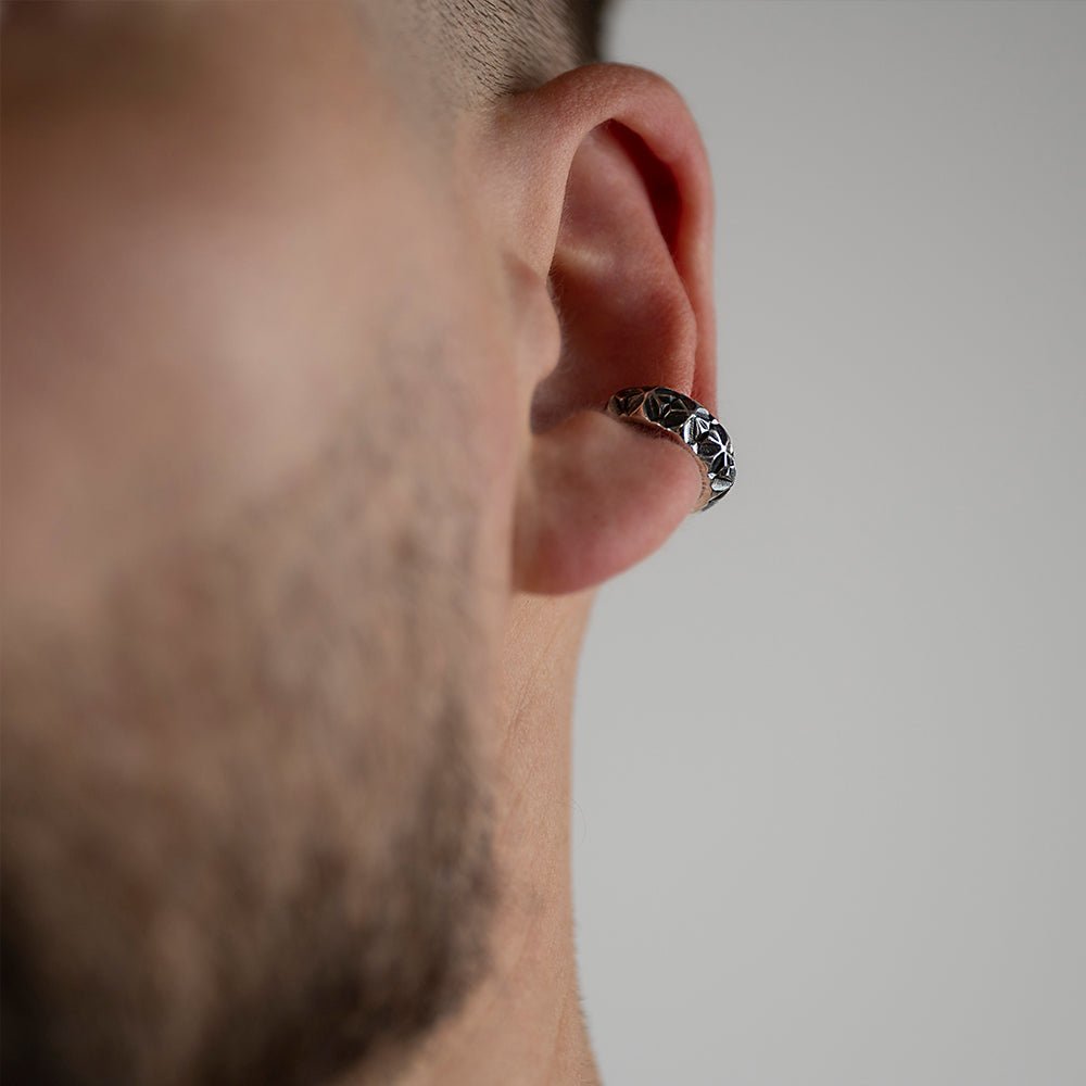 Male model wearing Dragonfly ear cuff, close-up of handcrafted sterling silver no piercing jewelry