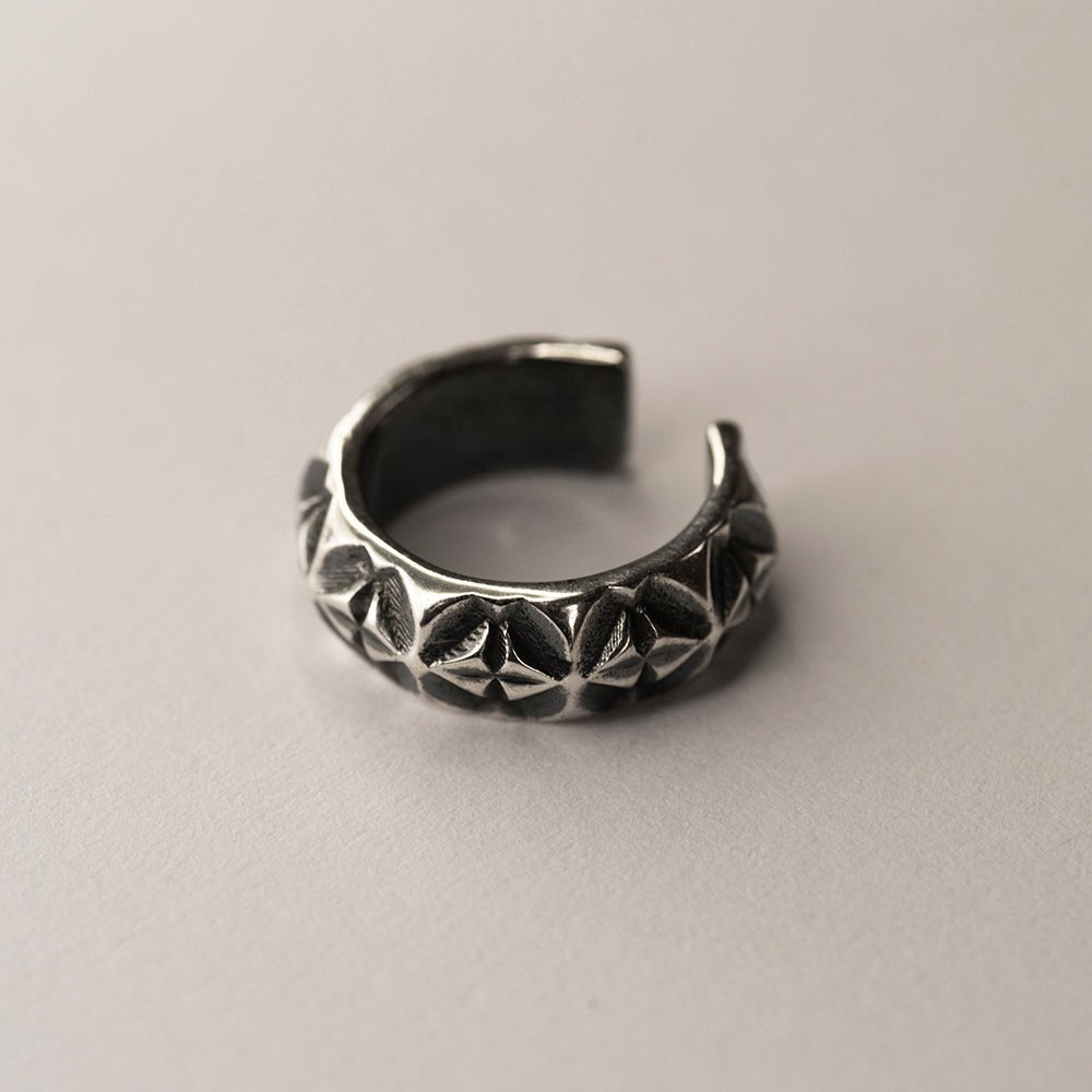 Dragonfly ear cuff - sterling silver ear cuff with geometrical pattern on white surface