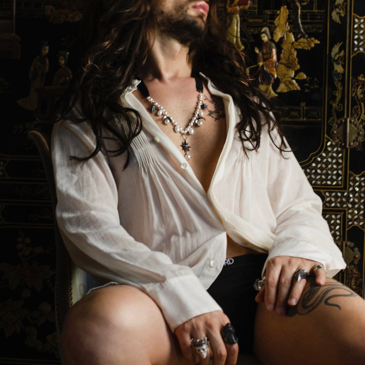 Stars and Moons choker on a male model styled with various different rings by Macabre Gadgets