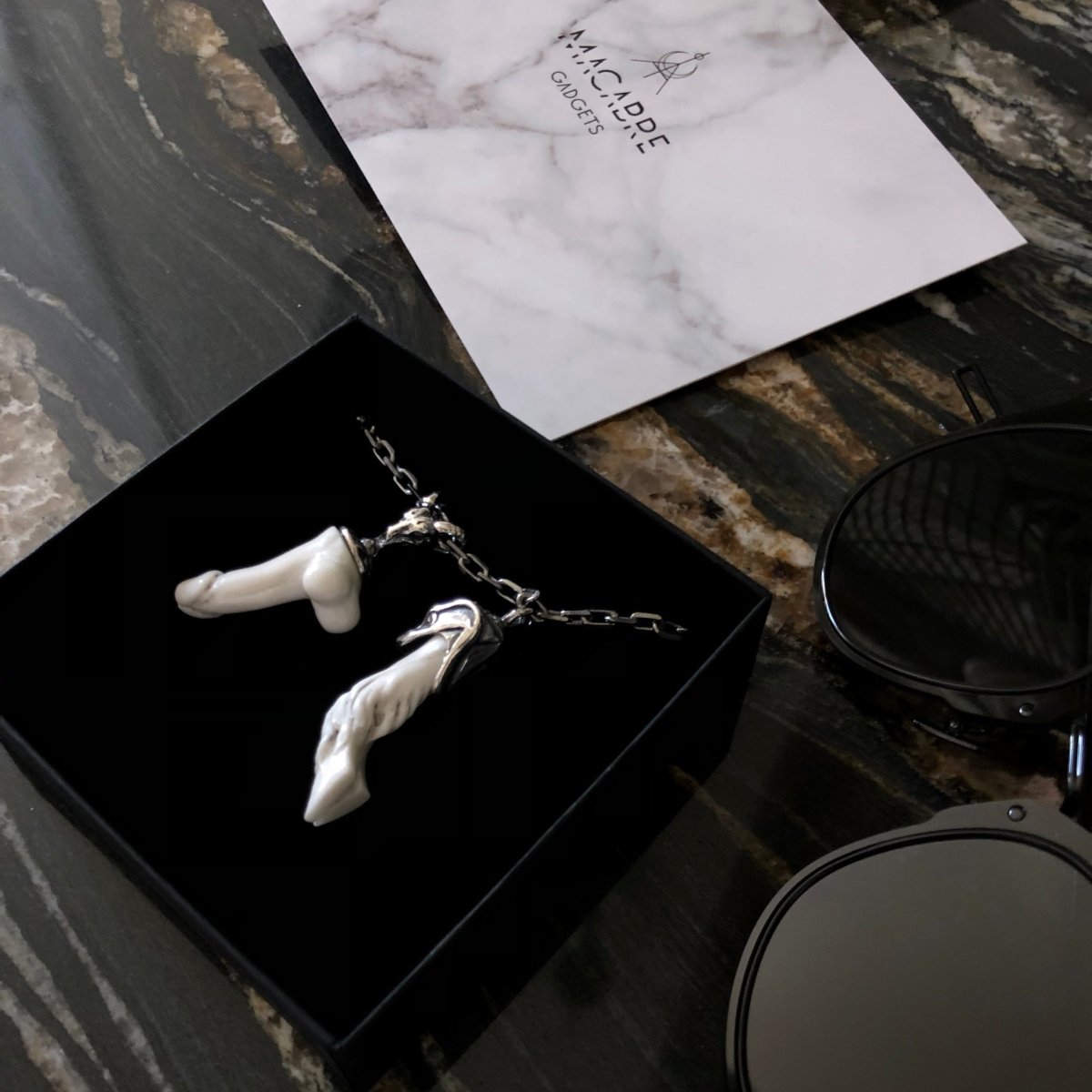 Faun Bracelet set in black jewelry box and placed on a dark marble surface
