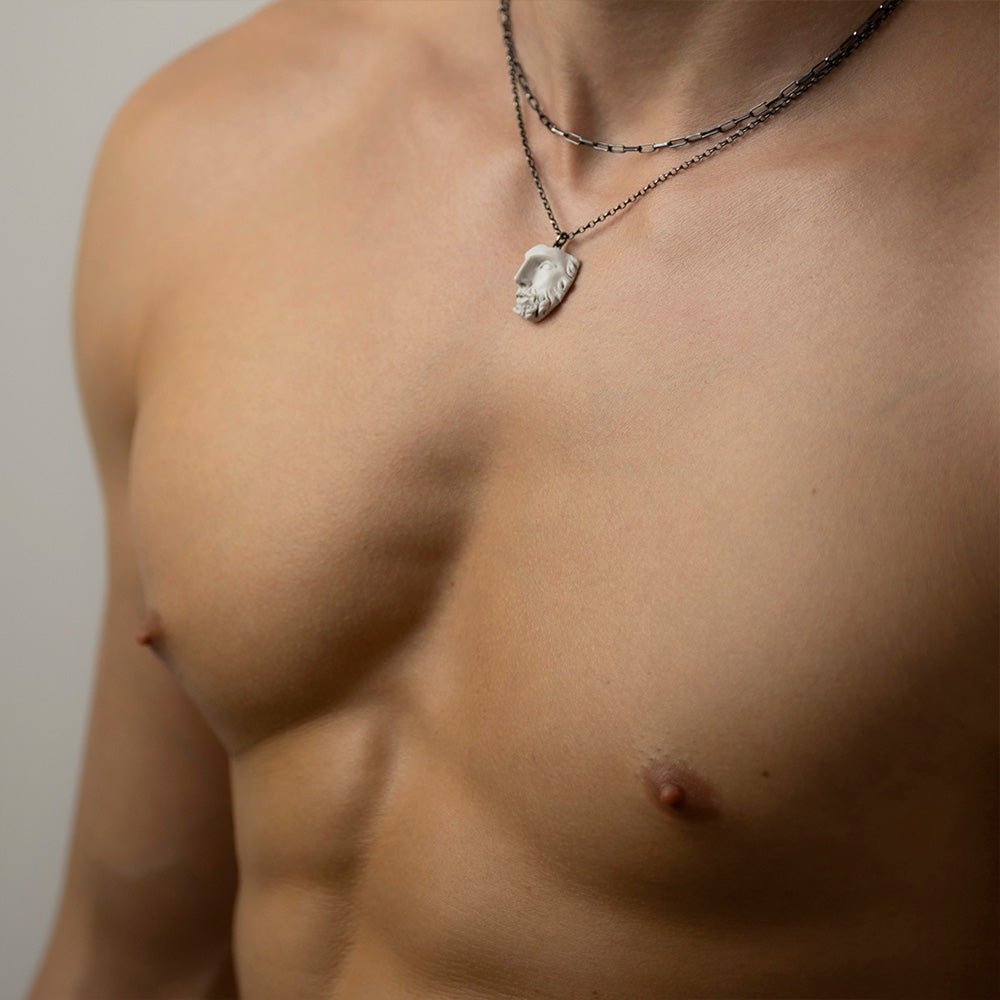 Heracles pendant - silver variant - on a male model, close-up