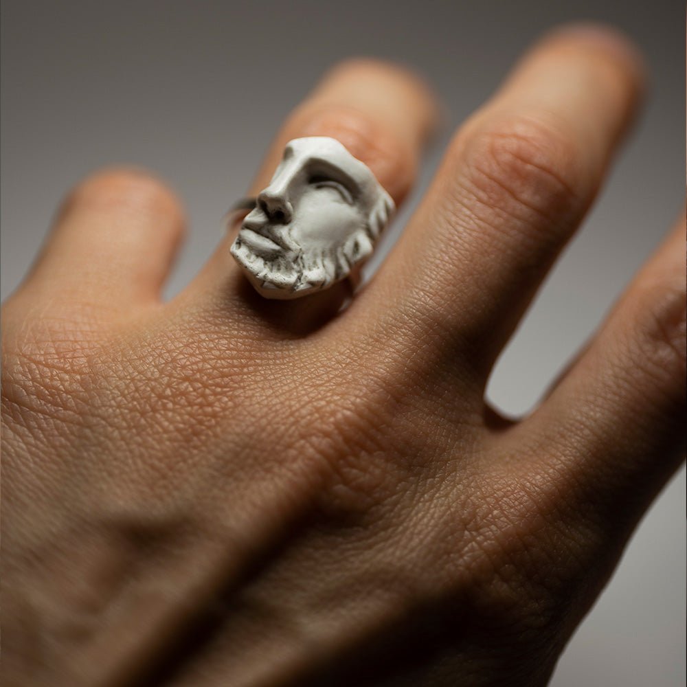 Male model wearing Heracles ring - raw fragment of marble sculpture on silver band, boho masculine ring