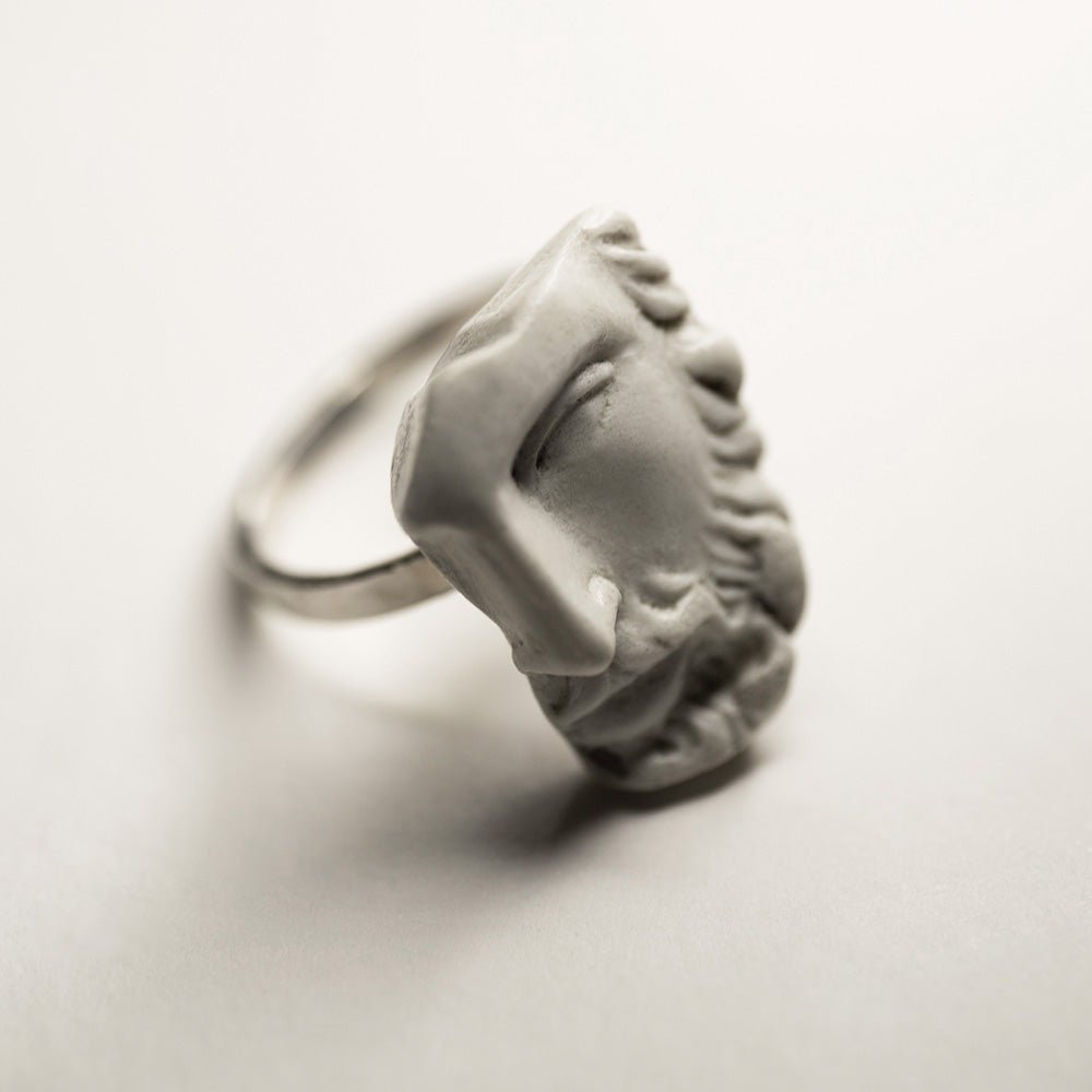 Heracles ring - modern sculpture ring featured a fragment  of the Hercules face and sleek silver band
