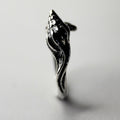 Close-up of Small Shell ring - dainty silver mermaid ring - focus on sea shell detail