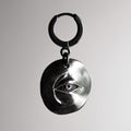 Oculus eye earring - gothic silver coin earring with an eye relief on a hoop clasp