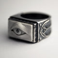Oracle Gothic Eye Ring - white variant - on its side, on a white background, focus on the eye element