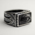 Oracle Gothic Eye Ring - black variant - semi side view on a white surface