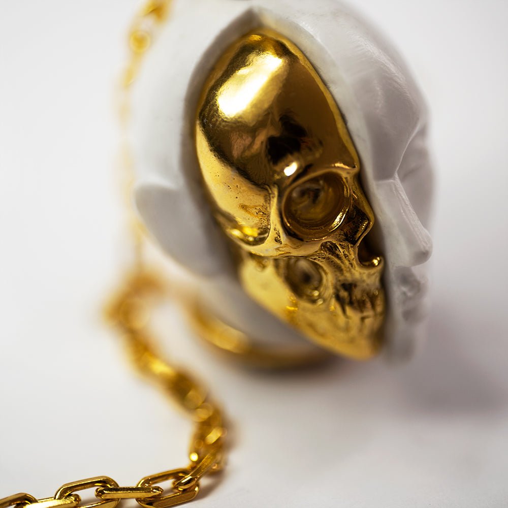 Oracle Skull pendant - close-up of gold-plated skull detail